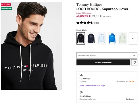 EIn männliches Model trägt einen Pullover.